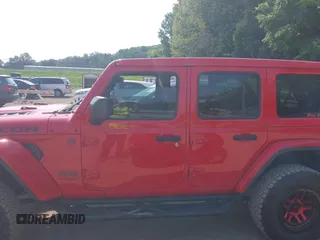 2022 Jeep Wrangler Unlimited Rubicon with VIN 1C4HJXFG0NW100620, listed as a IAAI auction lot 42534993 with 21,614 mi miles and . Bid and sale history available at DreamBid. Image 14.