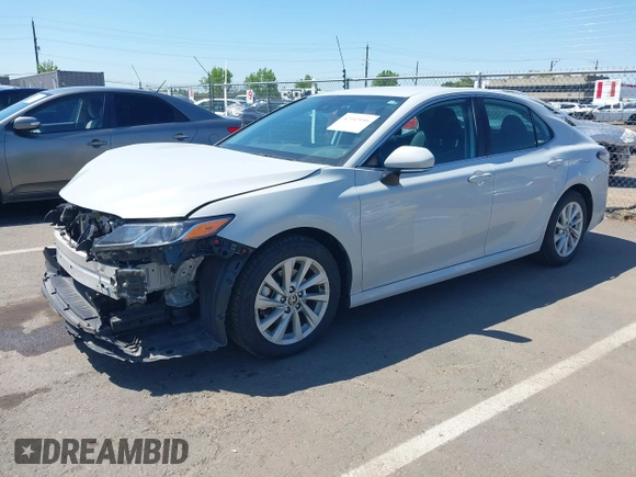 2024 Toyota Camry LE z VIN 4T1C11AK3RU214854, wystawiony jako IAAI lot #42143146 z przebiegiem 50 344 mil mil oraz . Historia ofert i sprzedaży dostępna na DreamBid. Obrazek 18.