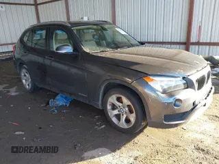 2013 BMW X1 28i with VIN WBAVM1C53DVW43228, listed as a IAAI auction lot 41301776 with 61,323 mi miles. Bid and sale history available at carsss.com. Image 1.