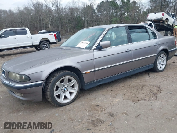 1998 BMW 7 Series 740il with VIN WBAGJ8323WDM23239, listed as a IAAI auction lot 41512630 with 221,673 mi miles. Bid and sale history available at carsss.com. Image 18.