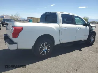 2021 Nissan Titan Pro-4X z VIN 1N6AA1ED5MN501877, wystawiony jako Copart lot #63714005 z przebiegiem 21 821 mil mil oraz Szkoda całkowita • Salvage title. Historia ofert i sprzedaży dostępna na DreamBid. Obrazek 3.