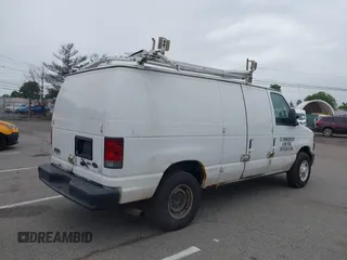 2010 Ford Econoline Cargo Commercial with VIN 1FTNE2EL1ADA99282, listed as a IAAI auction lot 42604073 with 128,942 mi miles and . Bid and sale history available at DreamBid. Image 4.