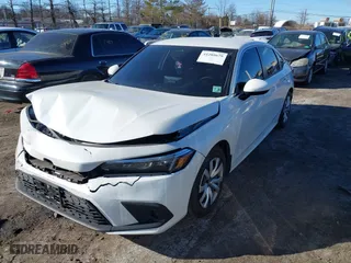 2023 Honda Civic Sedan LX with VIN 2HGFE2F28PH563613, listed as a IAAI auction lot 41289679 with 17,613 mi miles. Bid and sale history available at carsss.com. Image 17.