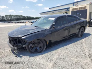 2021 Dodge Charger Police with VIN 2C3CDXAT1MH663070, listed as a Copart auction lot 60046005 with 64,553 mi miles and Salvage title. Bid and sale history available at DreamBid. Image 1.