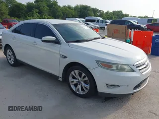 2012 Ford Taurus SEL z VIN 1FAHP2EW8CG134635, wystawiony jako IAAI lot #42273595 z przebiegiem 244 040 mil mil oraz . Historia ofert i sprzedaży dostępna na DreamBid. Obrazek 1.