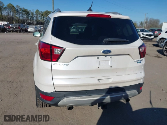 2019 Ford Escape Titanium with VIN 1FMCU9J91KUB21842, listed as a IAAI auction lot 41632210 with 104,900 mi miles. Bid and sale history available at carsss.com. Image 16.