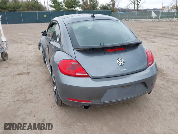 2012 Volkswagen Beetle with VIN 3VWV67AT0CM663718, listed as a IAAI auction lot 41860510 with 99,932 mi miles and . Bid and sale history available at DreamBid. Image 3.