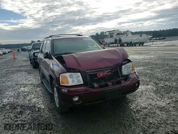 2003 GMC Envoy SLT with VIN 1GKDT13S032245485, listed as a Copart auction lot 84385304 with 139,183 mi miles and Salvage Title. Bid and sale history available at carsss.com. Image 11.