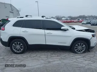 2021 Jeep Cherokee Latitude Lux with VIN 1C4PJLMN7MD130276, listed as a IAAI auction lot 41241629 with 64,485 mi miles. Bid and sale history available at carsss.com. Image 14.