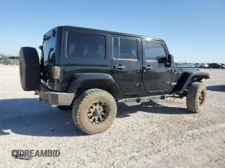 2012 Jeep Wrangler Unlimited Rubicon z VIN 1C4HJWFG9CL105047, wystawiony jako Copart lot #49494005 z przebiegiem 132 591 mil mil oraz Szkoda całkowita • Salvage title. Historia ofert i sprzedaży dostępna na DreamBid. Obrazek 3.