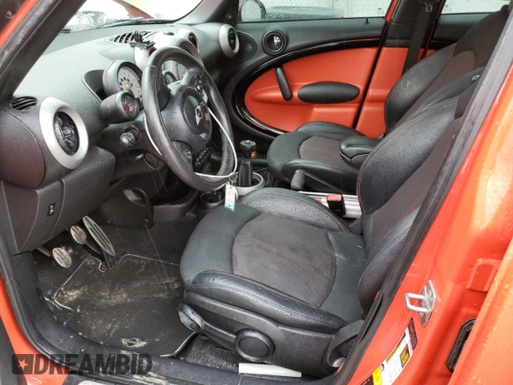 2012 MINI Countryman S with VIN WMWZC3C58CWM27870, listed as a Copart auction lot 46924325 with 117,911 mi miles and Salvage Title. Bid and sale history available at DreamBid. Image 7.