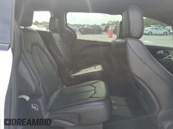 2024 Chrysler Pacifica Touring L with VIN 2C4RC1BG2RR116768, listed as a Copart auction lot 54598075 with 12,054 mi miles and Salvage title. Bid and sale history available at DreamBid. Image 11.