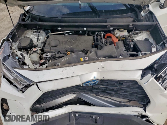 2021 Toyota RAV4 Hybrid LE with VIN 4T3B6RFV8MU056574, listed as a Copart auction lot 56977735 with 19,032 mi miles and Salvage title. Bid and sale history available at DreamBid. Image 11.