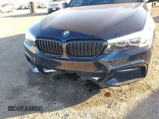 2020 BMW 5 Series 540i с VIN WBAJS1C01LCD20897, выставлен на аукционе IAAI как лот 41279762 с пробегом 62 886 миль миль и . История ставок и продаж доступна на DreamBid. Изображение 6.
