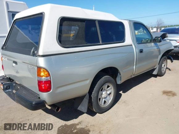 2003 Toyota Tacoma with VIN 5TENL42N83Z301987, listed as a IAAI auction lot 41635487 with 174,911 mi miles and . Bid and sale history available at DreamBid. Image 4.