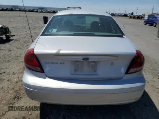 2005 Ford Taurus SE with VIN 1FAFP53U25A303516, listed as a Copart auction lot 63250505 with 203,463 mi miles and Salvage title. Bid and sale history available at DreamBid. Image 6.