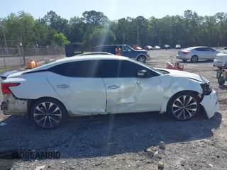 2016 Nissan Maxima SL z VIN 1N4AA6AP8GC429756, wystawiony jako IAAI lot #42262674 z przebiegiem 183 768 mil mil oraz . Historia ofert i sprzedaży dostępna na DreamBid. Obrazek 13.