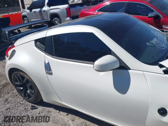 2015 Nissan 370Z Sport with VIN JN1AZ4EH9FM443719, listed as a IAAI auction lot 41677286 with 87,967 mi miles and . Bid and sale history available at DreamBid. Image 13.