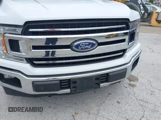 2019 Ford F-150 XL z VIN 1FTMF1C51KKC79270, wystawiony jako IAAI lot #42337543 z przebiegiem 146 916 mil mil oraz . Historia ofert i sprzedaży dostępna na DreamBid. Obrazek 6.
