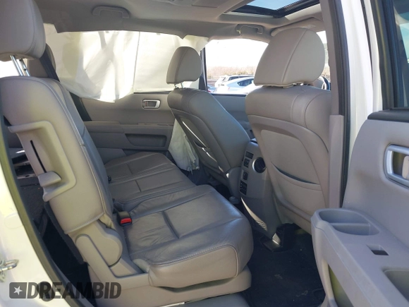 2015 Honda Pilot Touring with VIN 5FNYF3H97FB023842, listed as a IAAI auction lot 41673881 with 106,110 mi miles. Bid and sale history available at carsss.com. Image 8.