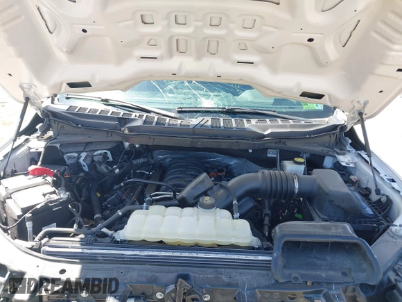 2023 Ford F-150 XL with VIN 1FTFW1E51PFB15197, listed as a IAAI auction lot 41869063 with 33,980 mi miles and . Bid and sale history available at DreamBid. Image 10.