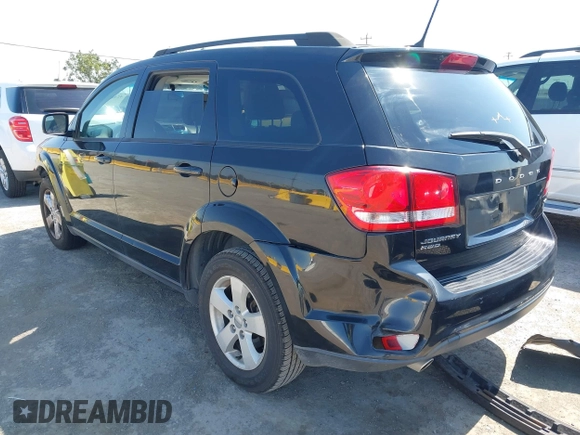 2012 Dodge Journey SXT with VIN 3C4PDDBG0CT300469, listed as a IAAI auction lot 42467233 with 127,420 mi miles and . Bid and sale history available at DreamBid. Image 3.