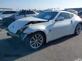 2014 Nissan 370Z Touring with VIN JN1AZ4EH7EM635655, listed as a IAAI auction lot 42217280 with 150,200 mi miles and . Bid and sale history available at DreamBid. Image 2.
