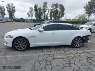 2016 Jaguar XJ with VIN SAJWA2GE3GMV93216, listed as a IAAI auction lot 41890225 with 70,007 mi miles. Bid and sale history available at carsss.com. Image 15.