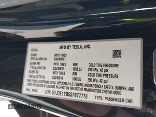 2025 Tesla Model 3 Long Range with VIN 5YJ3E1EB5SF877778, listed as a IAAI auction lot 41639595 with 8,295 mi miles and . Bid and sale history available at DreamBid. Image 9.