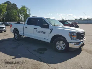 2023 Ford F-150 XL with VIN 1FTFW1ED8PFD25707, listed as a Copart auction lot 51474555 with 16,073 mi miles and Salvage title. Bid and sale history available at DreamBid. Image 4.