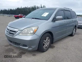 2007 Honda Odyssey EX-L with VIN 5FNRL38777B075985, listed as a IAAI auction lot 42083450 with 127,622 mi miles. Bid and sale history available at carsss.com. Image 2.