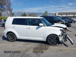 2014 Scion xB with VIN JTLZE4FE5EJ065953, listed as a IAAI auction lot 41850554 with 124,856 mi miles. Bid and sale history available at carsss.com. Image 14.