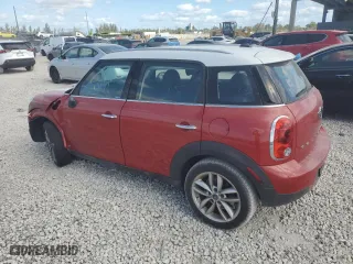 2013 MINI Cooper Countryman with VIN WMWZB3C57DWM09252, listed as a Copart auction lot 88791285 with 103,538 mi miles and Salvage Title. Bid and sale history available at carsss.com. Image 2.