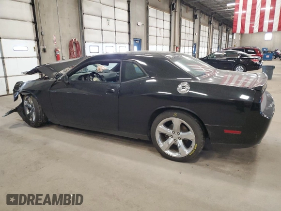 2013 Dodge Challenger R/T z VIN 2C3CDYBT9DH501059, wystawiony jako Copart lot #55139865 z przebiegiem 95 112 mil mil oraz Szkoda całkowita • Salvage title. Historia ofert i sprzedaży dostępna na DreamBid. Obrazek 2.