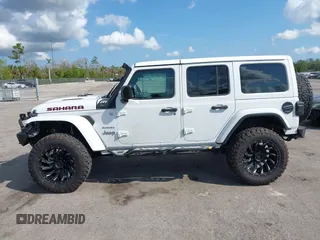 2020 Jeep Wrangler Unlimited Sahara with VIN 1C4HJXEN7LW213459, listed as a IAAI auction lot 41502047 with 40,816 mi miles. Bid and sale history available at carsss.com. Image 14.