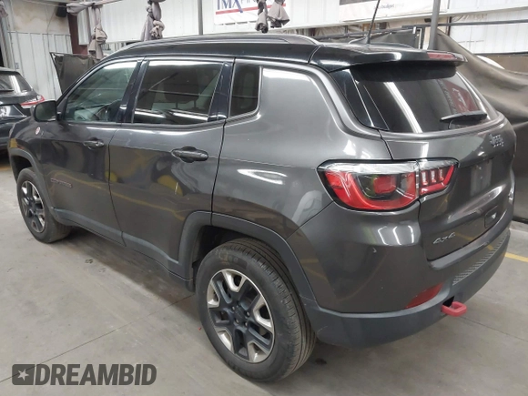2018 Jeep Compass Trailhawk with VIN 3C4NJDDB5JT451600, listed as a IAAI auction lot 41893541 with 155,528 mi miles and . Bid and sale history available at DreamBid. Image 3.