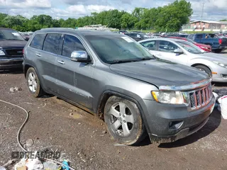 2011 Jeep Grand Cherokee Overland Summit with VIN 1J4RR6GT3BC713812, listed as a IAAI auction lot 42398585 with 208,476 mi miles and . Bid and sale history available at DreamBid. Image 1.