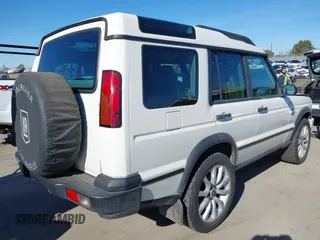 2004 Land Rover Discovery SE with VIN SALTY19424A833762, listed as a IAAI auction lot 41358827 with 144,416 mi miles. Bid and sale history available at carsss.com. Image 4.