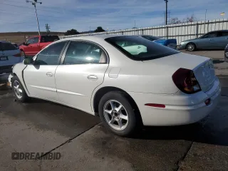 2001 Oldsmobile Aurora z VIN 1G3GR64HX14120650, wystawiony jako Copart lot #86421344 z przebiegiem 91 452 mil mil oraz Szkody całkowita. Historia ofert i sprzedaży dostępna na DreamBid. Obrazek 2.