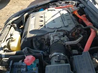 2005 Honda Accord with VIN JHMCN36445C016054, listed as a IAAI auction lot 43330439 with 125,411 mi miles and . Bid and sale history available at DreamBid. Image 12.