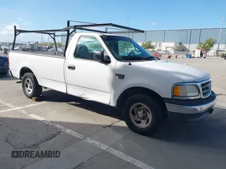 2000 Ford F-150 XL with VIN 1FTRF17WXYKA72880, listed as a IAAI auction lot 41989317 with 149,967 mi miles. Bid and sale history available at carsss.com. Image 1.