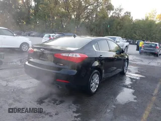 2014 Kia Forte EX with VIN KNAFX4A8XE5121630, listed as a IAAI auction lot 40517819 with 144,087 mi miles. Bid and sale history available at carsss.com. Image 4.