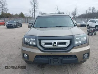 2011 Honda Pilot EX-L with VIN 5FNYF4H68BB038615, listed as a IAAI auction lot 41785830 with 164,324 mi miles and . Bid and sale history available at carsss.com. Image 12.