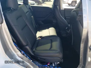 2024 Tesla Model Y Long Range с VIN 7SAYGAEE6RF131749, выставлен на аукционе Copart как лот 74548014 с пробегом 1 042 миль миль и Списание • Salvage title. История ставок и продаж доступна на DreamBid. Изображение 11.