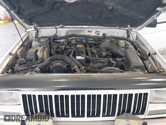 1996 Jeep Cherokee Country with VIN 1J4FT78S5TL232090, listed as a IAAI auction lot 42267272 with 255,417 mi miles and . Bid and sale history available at DreamBid. Image 10.