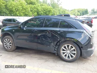 2019 Cadillac XT4 AWD Sport с VIN 1GYFZFR44KF140894, выставлен на аукционе IAAI как лот 42496698 с пробегом 79 768 миль миль и . История ставок и продаж доступна на DreamBid. Изображение 13.