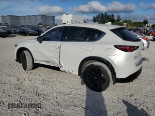 2024 Mazda CX-5 2.5 Carbon Turbo with VIN JM3KFBAY3R0445814, listed as a Copart auction lot 43348095 with 5,257 mi miles and Salvage Title. Bid and sale history available at carsss.com. Image 2.