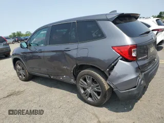 2019 Honda Passport EX-L with VIN 5FNYF8H51KB005843, listed as a Copart auction lot 59501565 with 47,051 mi miles and Salvage title. Bid and sale history available at DreamBid. Image 2.