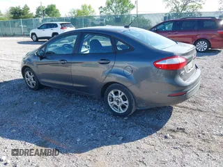 2015 Ford Fiesta SE z VIN 3FADP4BJ7FM158471, wystawiony jako IAAI lot #42090819 z przebiegiem 139 779 mil mil oraz . Historia ofert i sprzedaży dostępna na DreamBid. Obrazek 3.