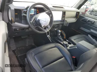 2023 Ford Bronco with VIN 1FMDE5CP1PLA92944, listed as a Copart auction lot 66625304 with 115,179 mi miles and Salvage title. Bid and sale history available at DreamBid. Image 8.